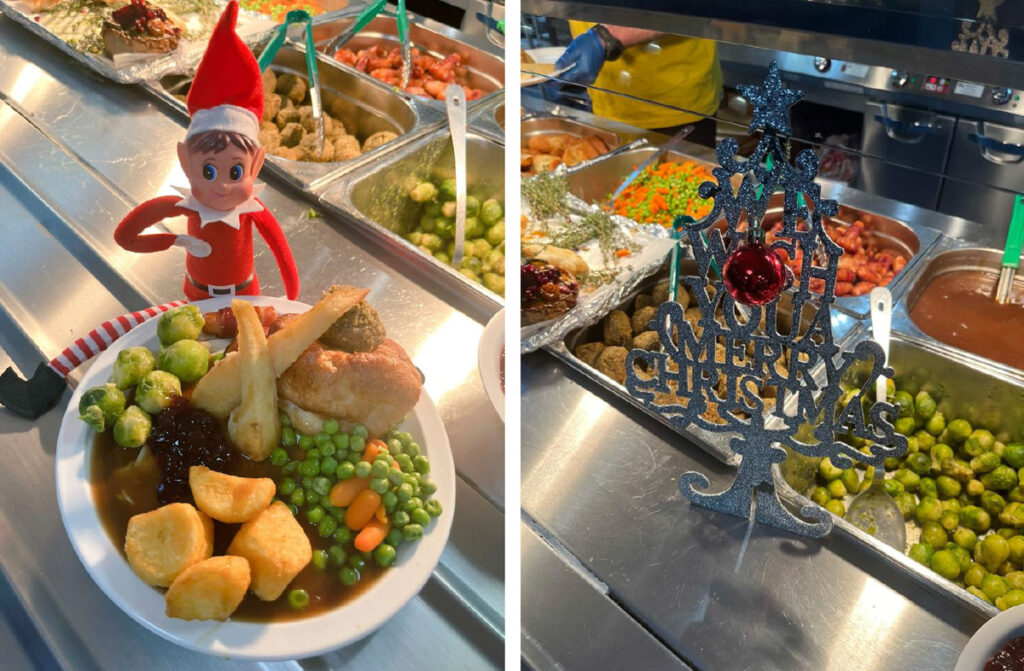 A picture of the servery in the kitchen with a Christmas Dinner and an Elf on the Shelf.