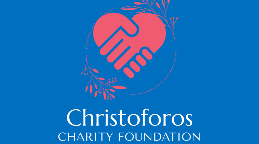blue background with a red heart which is the logo for christoforos charity foundation for anti-bullying week