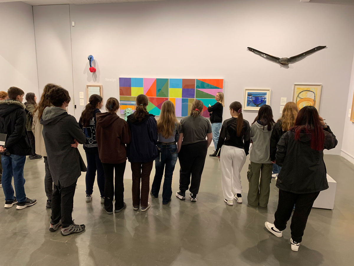 students viewing art in a gallery