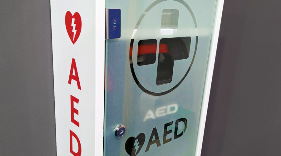 an image of the heart defibrillator on the wall at east barnet school