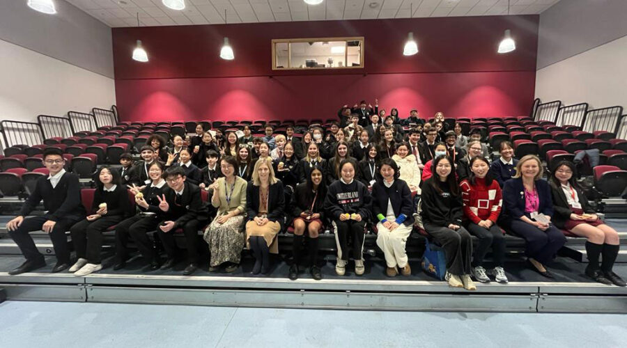 all the chinese visitors sitting in the east barnet school auditorium