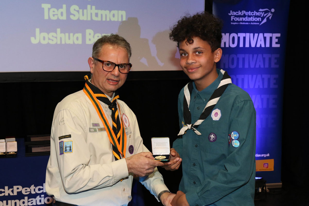 scout being awarded the jack petchey award by the county commissioner